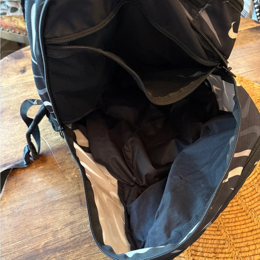 Nike Black and Gray Swoosh Logo Pattern Backpack
